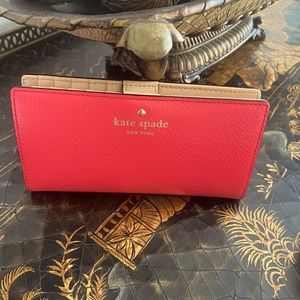 Kate Spade New York coral leather wallet